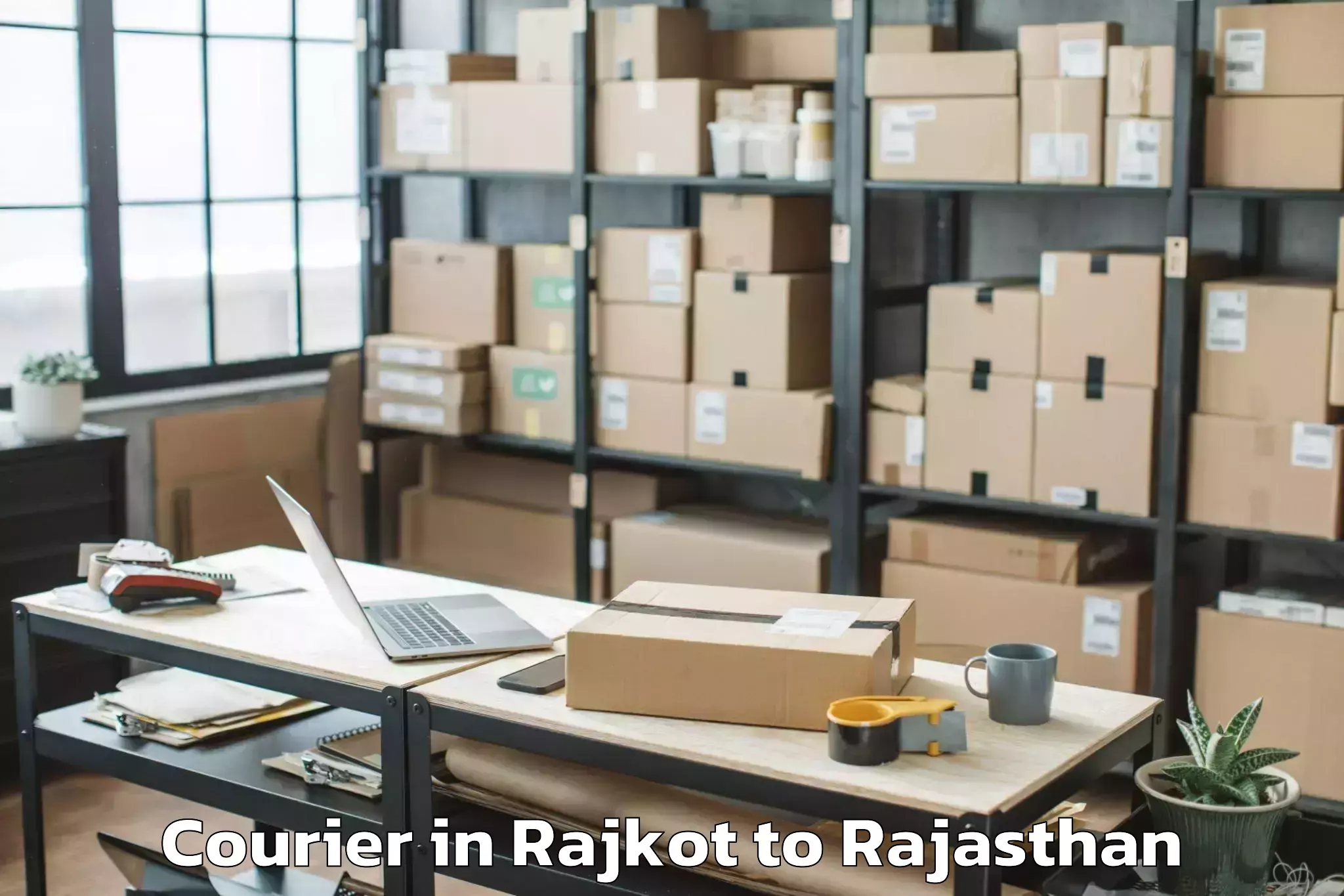 Leading Rajkot to Bari Dholpur Courier Provider